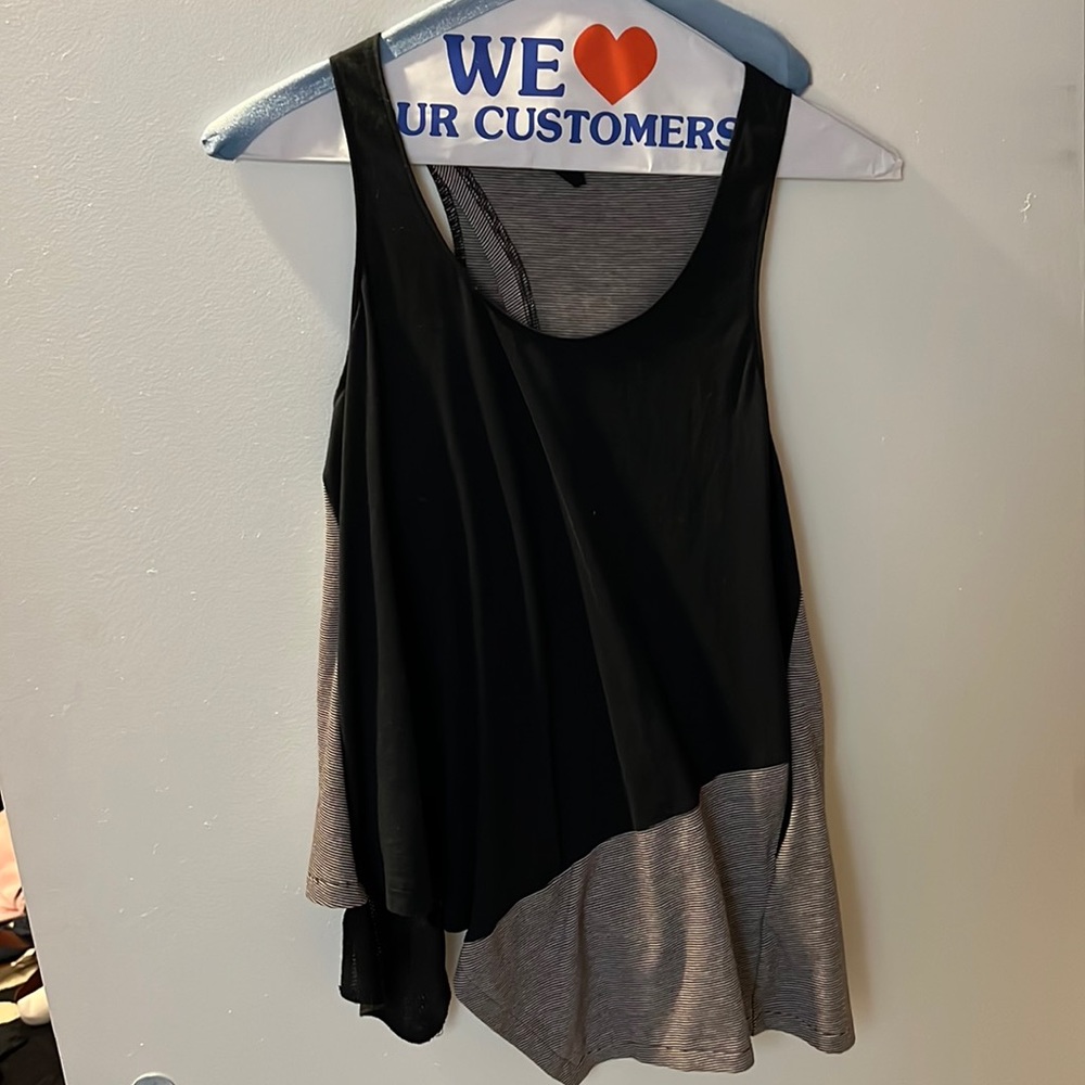 Blank tank top with striped design on the back and open back size small